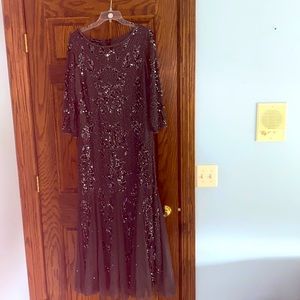 I am selling a Pissarro Nights Dress. The size is a 12 and only worn once.